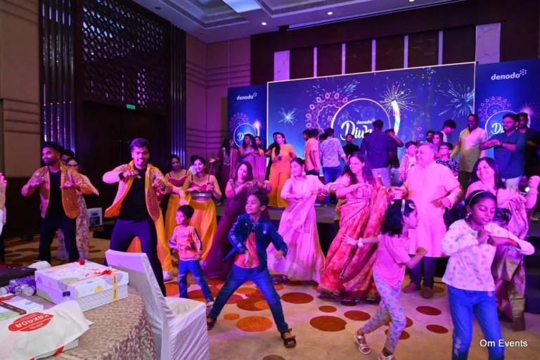 Group dance on a lit stage, Venue set-ups, 2023, organised by OM Events