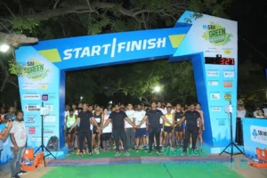 Runners at the start and finish arch, SBI Green Marathon, 2019, organised by OM Events