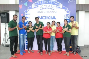 Team photo at the 20 years celebration backdrop, Nokia Chennai 20 years celebration, 2023, organised by OM Events