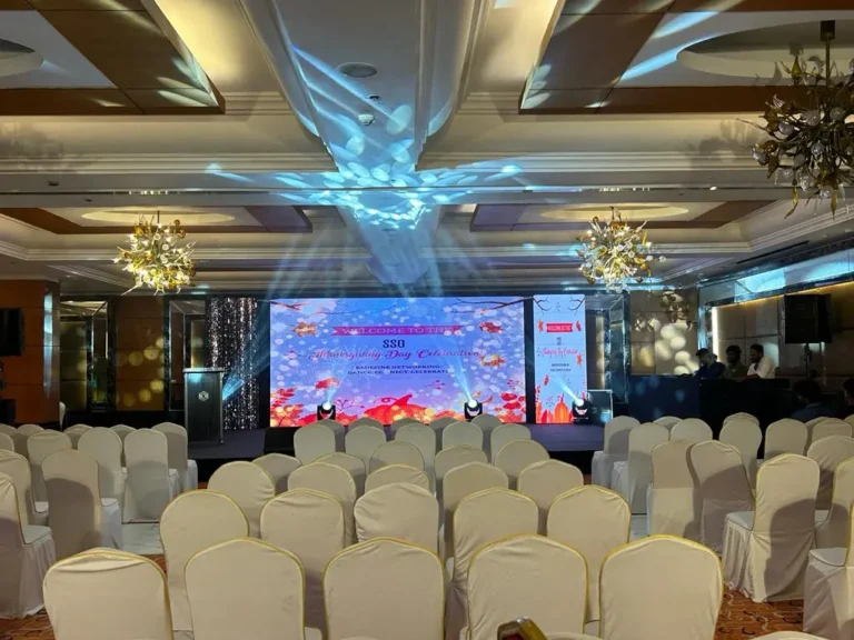 Ballroom with a projected ceiling and LED stage, Annual day stagecraft, 2024, organised by OM Events