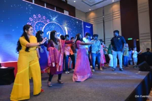 Employees dancing at the Diwali party, Denodo Diwali party, 2023, organised by OM Events