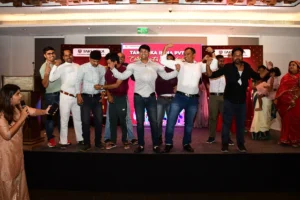Employees dancing on stage at the Takenaka Family Festival