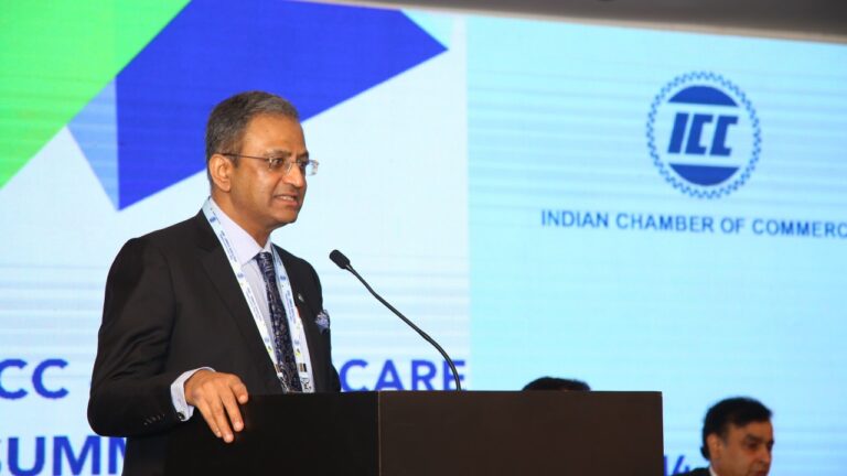 Speaker addressing an Indian Chamber of Commerce event in Chennai