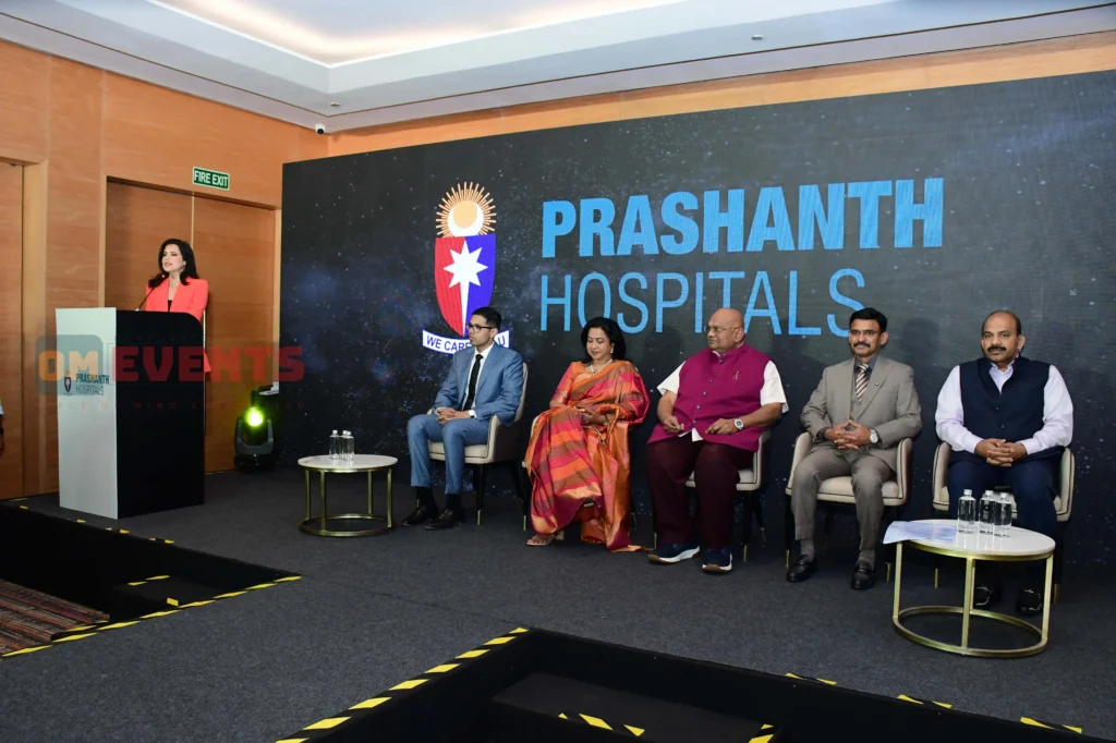 Prashanth Hospitals launch with guests of honour on stage