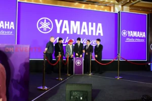 Leadership on the purple branded stage, Yamaha keyboard launch, 2026, organised by OM Events