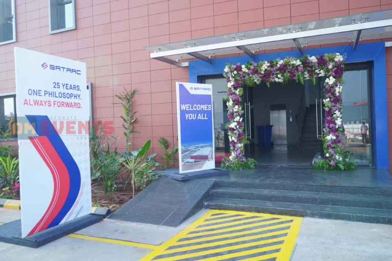 Flower arch welcome at a factory entrance